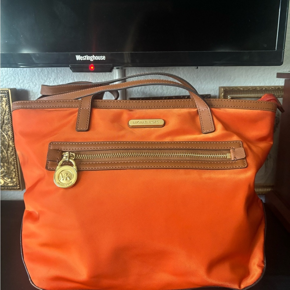 Michael Kors Vibrant Orange Tote with Brown Trim